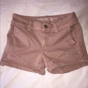 Dusty pink butt enhancing American eagle shorts